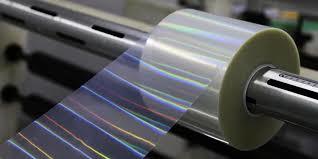 Is the laser film laminate adhesive compatible with the materials it will be laminating?